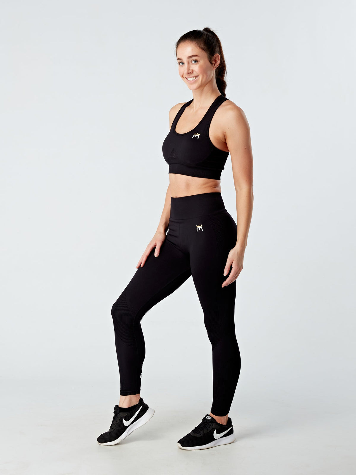 EVOLVE GOLD LUX SPORTS BRA - BLACK - Empire Activewear