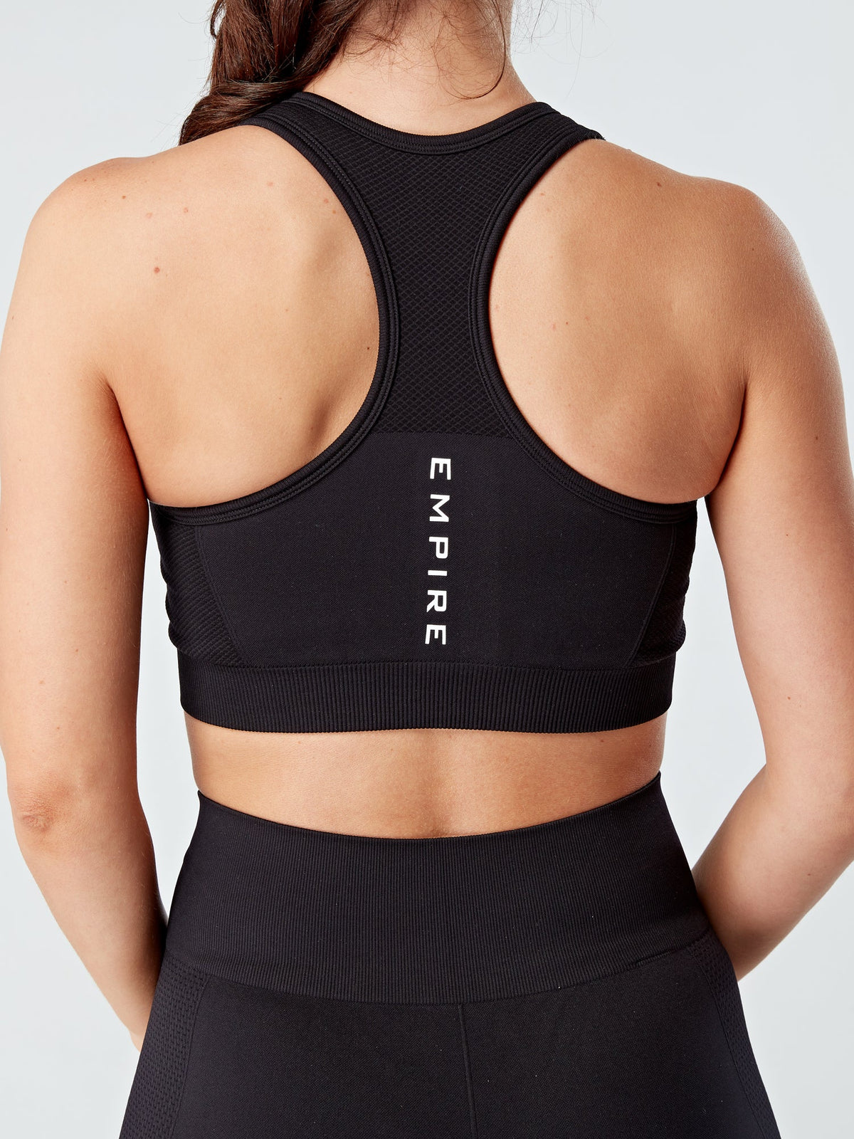 EVOLVE GOLD LUX SPORTS BRA - BLACK - Empire Activewear