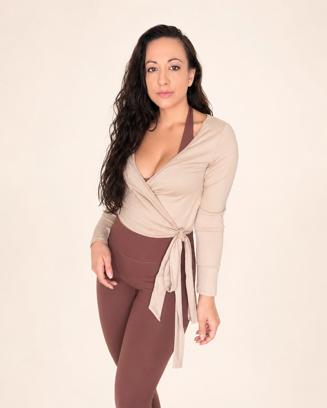 A lady wearing the contour sculpt wrap in beige