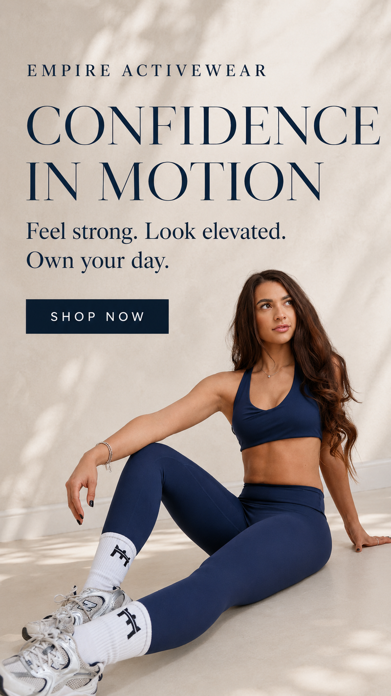 A woman wearing a navy blue activewear set consisting of a sports bra and leggings, sitting on a light beige floor with a white Empire Activewear 'Confidence in Motion' promotional banner overlaid at the top.