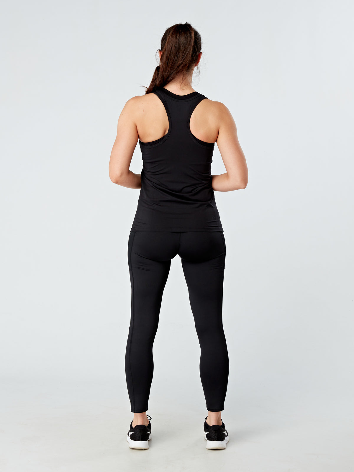 Alt=“ E-vest is perfect for layering with a tee, under your favourite sweater or even paired with jeans for that causal but sleek look. Made from a silky stretchy material-same fabric as our pocket leggings. Ultra light fabric which is what you want when having a high intense work out day”