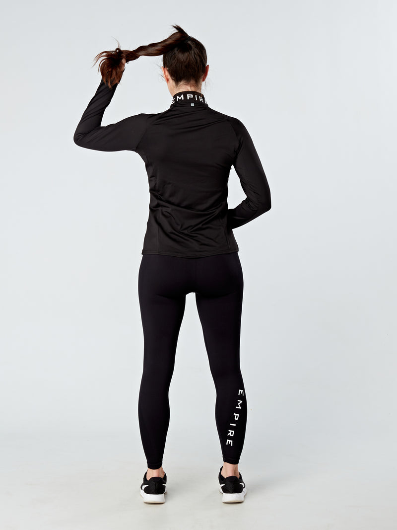 Alt=“ long sleeved half zip top will help you stay cool and dry. Engineered to wick sweat away from your body and keep you feeling light and comfortable during high-intensity exercise, this ultra-stretch fabric provides total freedom of movement with added thumb holes. This top can be paired with your favourite leggings or for everyday wear. The extra bonus of a small pocket at the front of the top provides a secure place for your EarPod”