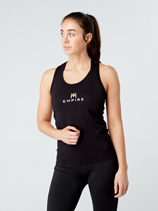 Alt=“ The E-vest is made of a buttery soft fabric. It's a perfect option for HIIT training, yoga and life in general. A little loose on those days when you don't want to wear anything too tight. It pairs well with our Evolve Gold High waisted leggings and is such a luxe piece for you to enjoy! The Evolve E-vest perfectly fits in with your active lifestyle, providing style and comfort at an affordable price making it easy to look great while working out or relaxing.”