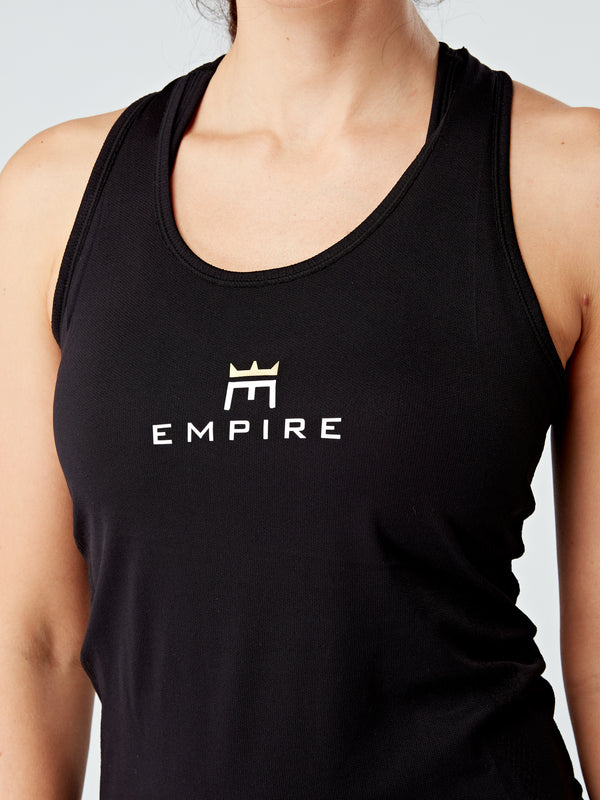Alt=“ The E-vest is made of a buttery soft fabric. It's a perfect option for HIIT training, yoga and life in general. A little loose on those days when you don't want to wear anything too tight. It pairs well with our Evolve Gold High waisted leggings and is such a luxe piece for you to enjoy! The Evolve E-vest perfectly fits in with your active lifestyle, providing style and comfort at an affordable price making it easy to look great while working out or relaxing.”