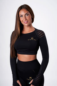 Alt=“black long sleeved crop top with mesh holes on shoulders and arms”