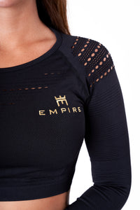 Alt=“black long sleeved crop top with mesh holes on shoulders and arms”